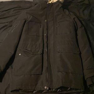 Black jacket with fur hood